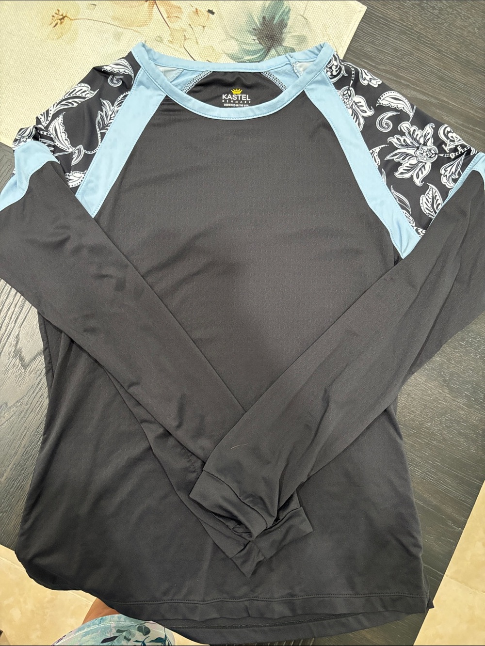 Black Long-Sleeve Performance Shirt with Light Blue Accents